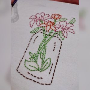 Hand embroidered canvas with flower vase