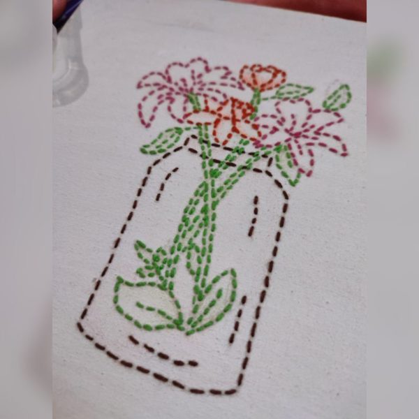 Hand embroidered canvas with flower vase