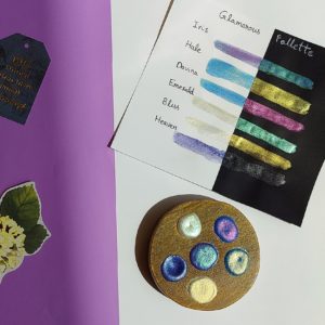 Handmade watercolor paints in wooden palette