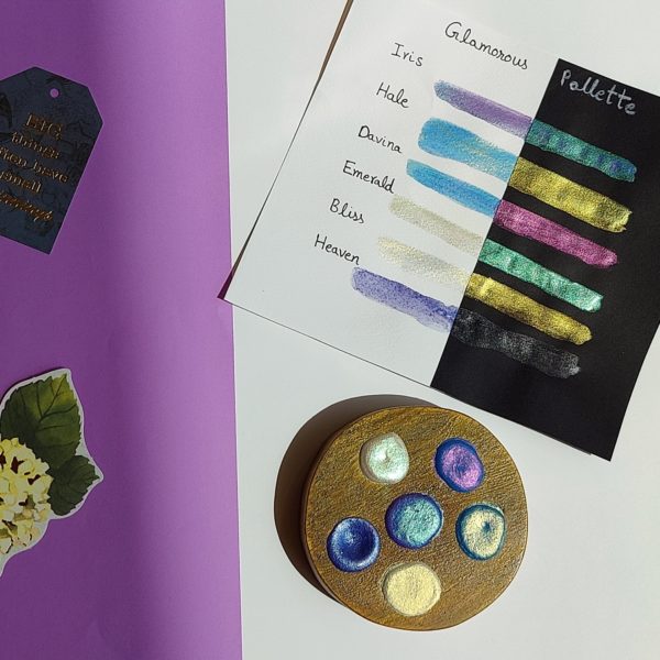 Handmade watercolor paints in wooden palette